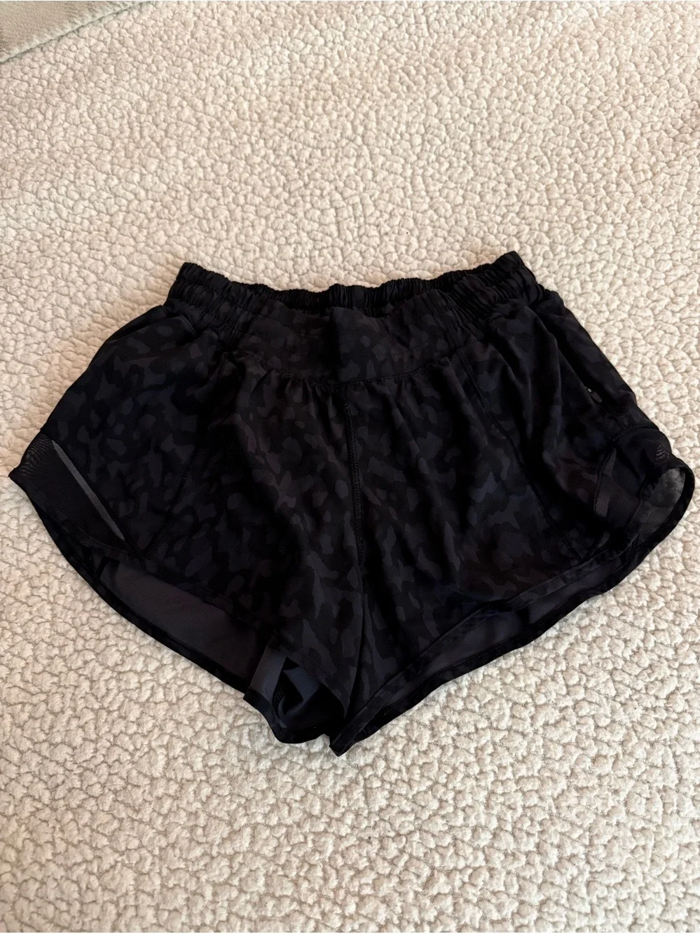 Lululemon Hotty Hot low rise shorts. Size 6. 2.5 inseam. Black animal print